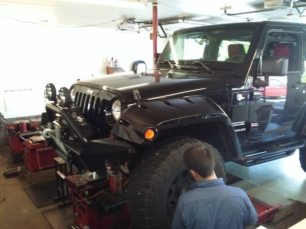 Jim's Alignment Services shop interior with professional equipment